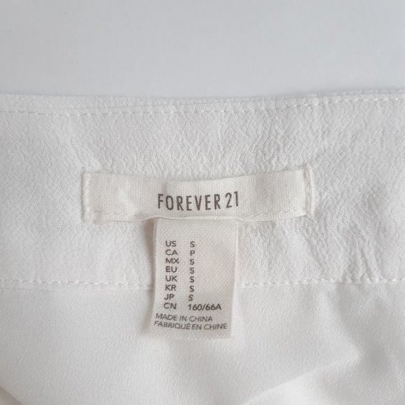 Pleated rayon skirt with lace detail S/P - Picture 7 of 9